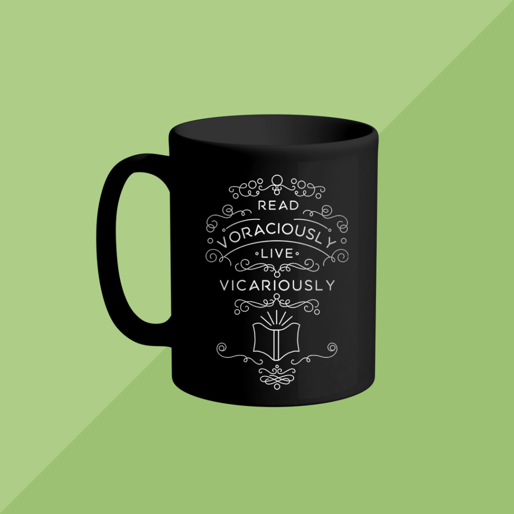 Mug mockup featuring the "Read Voraciously, Live Vicariously" design.