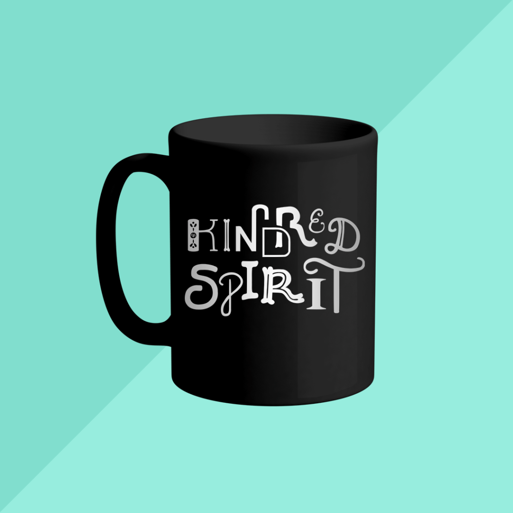 Mockup of a mug featuring the "Kindred Spirit" design